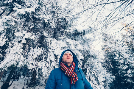 Man in snow forest