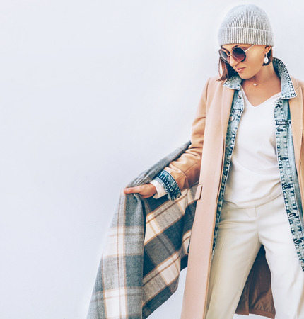 Young Woman dressed in multilayered autumn outfitの写真素材
