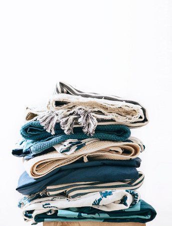 Pile of blue and beige laundry 2の写真素材