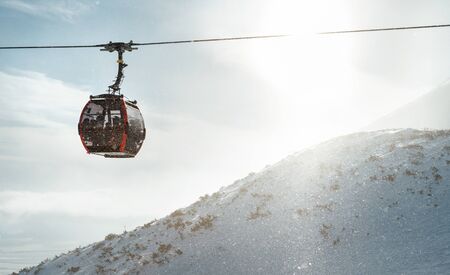 High Tatras cabine gondola rope way carrying a skiers to the mountain top.の写真素材