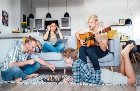 Family at living room together.の写真素材