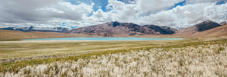 Stunning Kyagar Tso Lake panorame with Spangnak Ri mountain in the Leh district of Ladakh, North India. Remote wild places pearls concept image.の写真素材