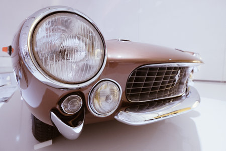 Modena, Italy - July 14, 2021: Ferrari 250GTL "Big eye" front light lamp wide angle shoot with radiator grill. Italian high-performance Italian sports car in Museo Casa Enzo Ferrari, Italy.のeditorial素材