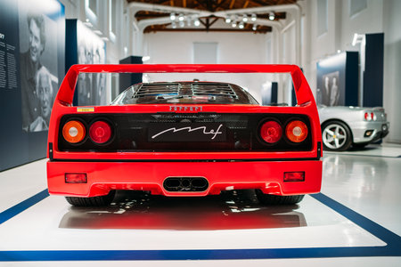 Modena, Italy - July 14, 2021: Red racing Ferrari F40 model rear view high-performance Italian sports rear mid-engine car Pininfarina design studio in Museo Casa Enzo Ferrari, Italy.のeditorial素材