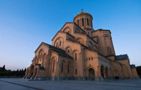 Holy Trinity Cathedral of Tbilisi also knowm as Sameba and main cathedral of the Georgian Orthodox Church litted with evening sunset light. Tbilisi, Georgia.の写真素材