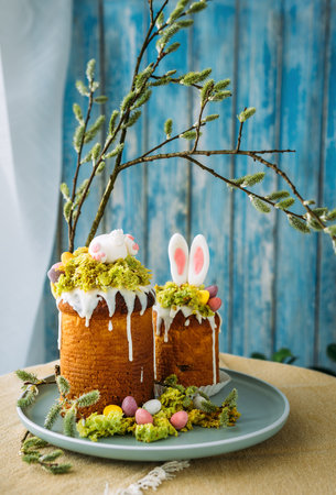 Paska - the Easter Eve sweet bread with icing decorated with eatable "moss" still life. Popular dessert during Eastern Orthodox Easter Holiday. Old cultures traditions and healthy eating concept imageの写真素材