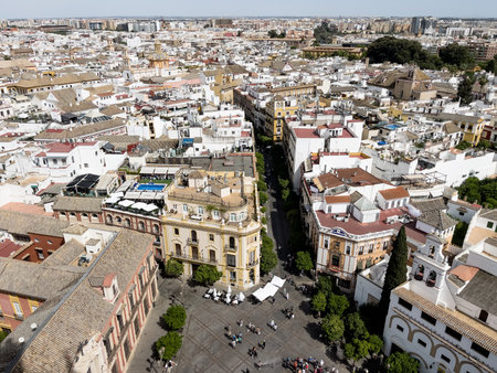 Aerial top view from La Giralda bell tower to the historic Seville city center in Cathedral of Seville, Andalusia, Southern Spain.の写真素材
