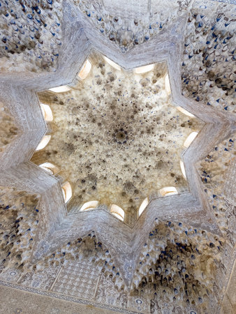 Beautyfull arch,capitals and stucco decoration portico in Mexuar Palace of the Lions, Alhambra, Andalusia, Spain. Magic breathtaking carved decoration  in orient style.のeditorial素材