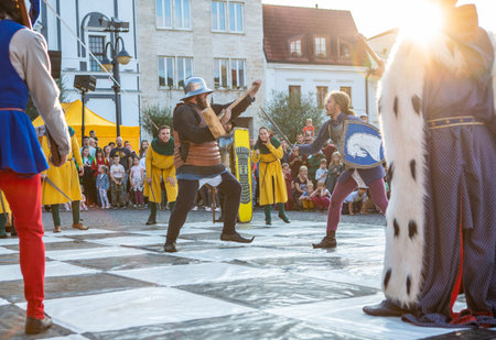 Zilina, Slovak RepubliÑ, Slovakia - July 28, 2023: Live chess figurines dressed in medieval costumes and armours during traditional annual restoration known as a "Stredoveky den" in Zilina, Slovakia.のeditorial素材