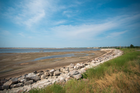 Nikopol city, Dnipropetrovsk Oblast with terrible Disaster Ecocide landscape of dried up Kakhovka Reservoir near Enerhodar as result of Kakhovka Dam damaging on 6 June 2023の写真素材