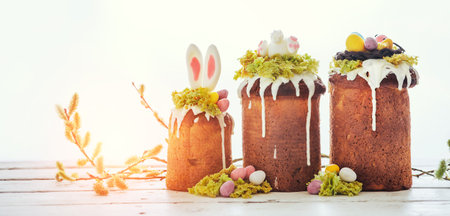 Paska - Easter Eve sweet bread with icing decorated with eatable "moss" still life with willow. Popular dessert during Eastern Orthodox Easter. Old cultures traditions and healthy eating concept imageの写真素材