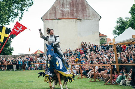 ÄervenÃ½ KameÅ Castle, Slovakia - May 25, 2024: People in medieval attires historical reenactment event. Reconstructions provide valuable insights into daily life, past eras traditions in Slovakia.のeditorial素材