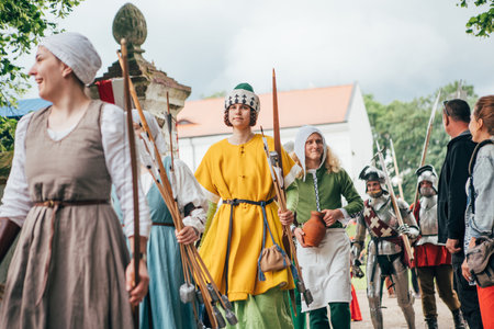 ÄervenÃ½ KameÅ Castle, Slovakia - May 25, 2024: People in medieval attires historical reenactment event. Reconstructions provide valuable insights into daily life, past eras traditions in Slovakia.のeditorial素材