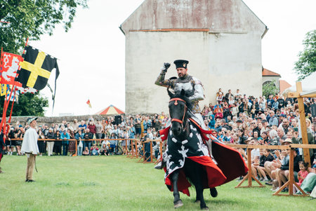 ÄervenÃ½ KameÅ Castle, Slovakia - May 25, 2024: People in medieval attires historical reenactment event. Reconstructions provide valuable insights into daily life, past eras traditions in Slovakia.のeditorial素材