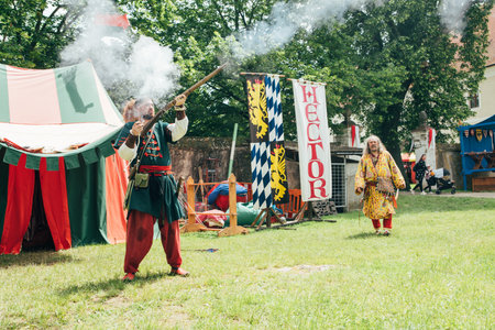 ÄervenÃ½ KameÅ Castle, Slovakia - May 25, 2024: People in medieval attires historical reenactment event. Reconstructions provide valuable insights into daily life, past eras traditions in Slovakia.のeditorial素材