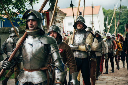 ÄervenÃ½ KameÅ Castle, Slovakia - May 25, 2024: People in medieval attires historical reenactment event. Reconstructions provide valuable insights into daily life, past eras traditions in Slovakia.のeditorial素材