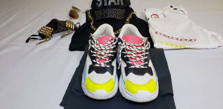 stylish outfit chains and sneakers outfit with chinstrap
