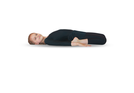little girl doing yoga on white backgroundの写真素材