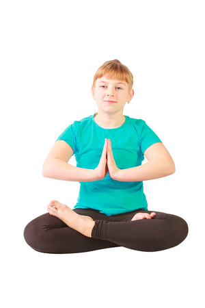 beautiful flexible woman doing yoguna white backgroundの写真素材