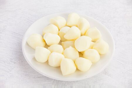 delicious fresh mozzarella on a white plateの写真素材