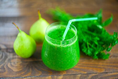 Tasty and healthy green smoothies from parsley and fruitの写真素材
