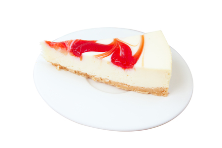 delicious cheesecake with strawberries on a plateの写真素材