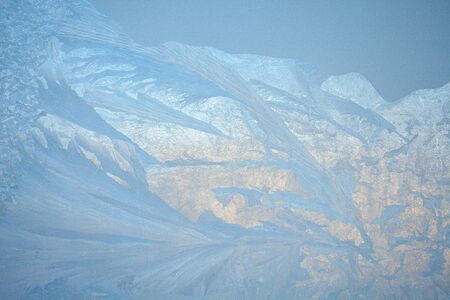 beautiful winter texture patterns of frost on the window