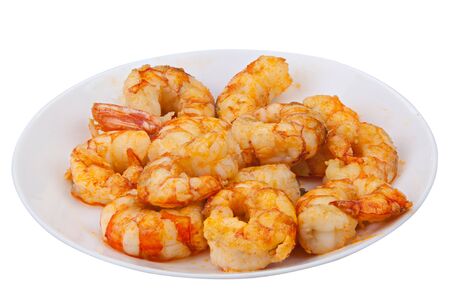 delicious appetizing prawns on white plate on white backgroundの写真素材