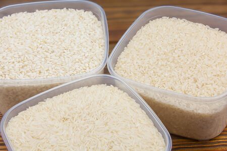 Raw rice groats for risotto on a plate