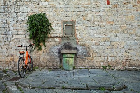 Beautiful Italian street of a small old provincial townの写真素材