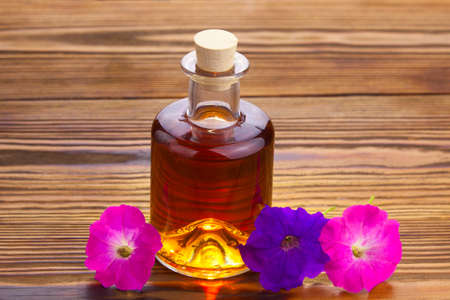 Essential oil of a muscari flower on a table in a beautiful bottleの写真素材