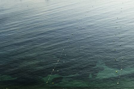 clear water of the Mediterranean Sea on the Riviera in Franceの写真素材