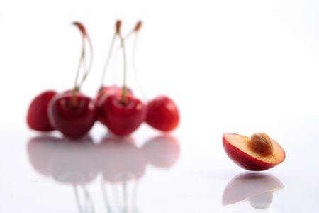few cherries and a cherry separatelyの写真素材