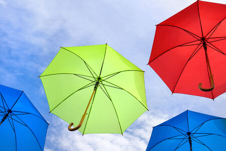 multicolored umbrella against the skyの写真素材