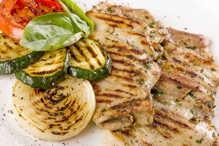 tasty juicy meat well roasted with vegetablesの写真素材