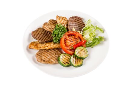 tasty juicy meat well roasted with vegetablesの写真素材