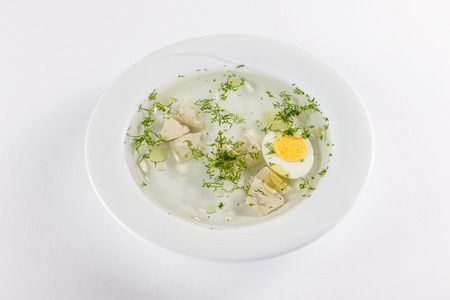meat broth with egg and fresh dillの写真素材