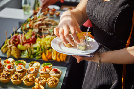 a lot of delicious food on the table, buffet, feastの写真素材
