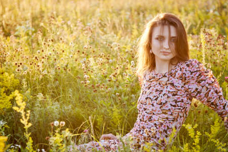 girl in the field in the sun