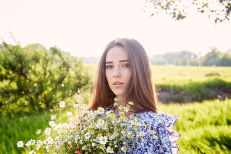 girl in the field in the sunの写真素材