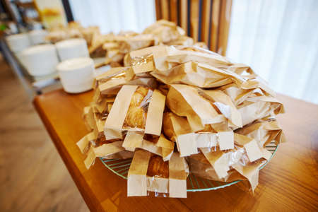 croissants and other treats on the tableの写真素材