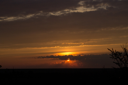 beautiful dawn. yellow sun rising above the horizonの写真素材