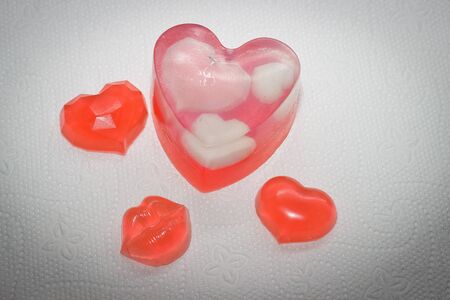 handmade soap on a white background in the shape of a heartの写真素材