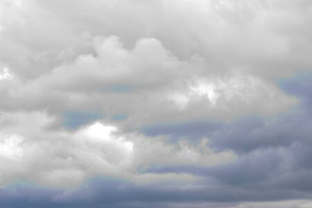 autumn sky covered with dark thundercloudsの写真素材