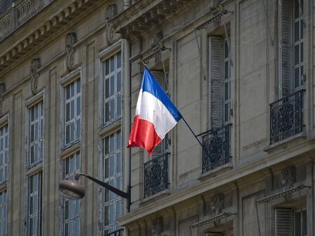 French flag in a Paris buildingの写真素材