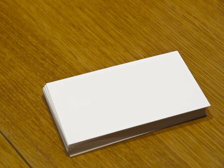 Blank Business Card on a wooden table