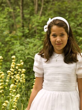 Beautiful girl in her first communion dayの写真素材