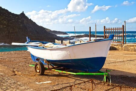 Old Rowboat in Garachico Pier, Tenerifeの写真素材
