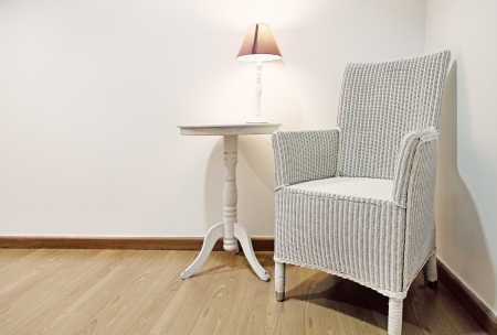 Vintage Wicker Chair in a Warm Interiorの写真素材