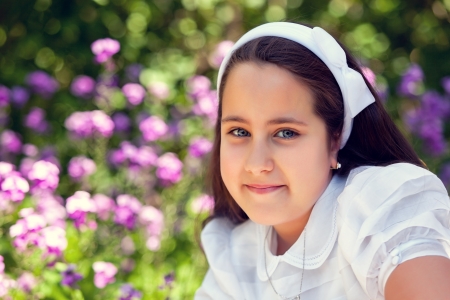 Cute Little Girl with her First Communion Dressの写真素材